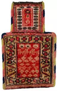 “Antique Kurdish salt bag with three dogs and paisley motifs” “Vintage Persian Namakdan from West Iran in natural dye colours” “Handwoven tribal salt bag with redone binding and symbolic motifs” “Rare Kurdish salt pouch featuring stylised dog design and natural dyes”