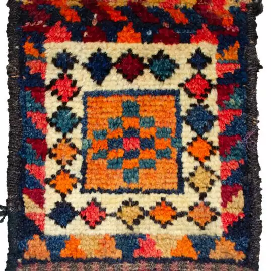 "Antique Lori bag face with blue lozenge on orange field" "Vintage Persian tribal textile with cream lozenge border" "Naturally dyed Lori weaving with colourful motifs" "Traditional Lori bag face from West Iran"