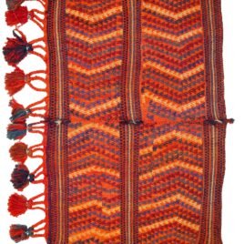 "Antique Qashqai Gahvareh cradle with pompons and tribal patterns" "Handwoven wool baby carrier from South Iran" "Traditional Persian dowry cradle textile" "Vintage tribal baby hammock from Qashqai tribe"