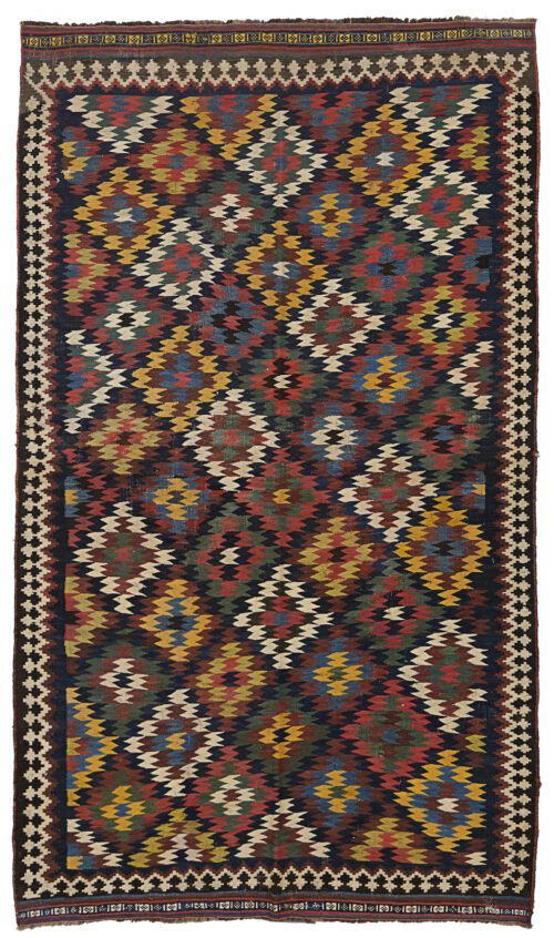 alt="Qashqai kilim with rare eye-dazzler design and jijim ends" alt="Fine tribal kilim in unusual size with optical pattern" alt="Collector-grade Qashqai kilim with natural dyes and bold geometry" alt="Handwoven Persian kilim with fine finishing and tribal artistry"