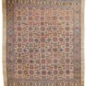 “Antique Bakhshaysh carpet with rare ground colour and floral design” “Vintage Persian rug from Bakhshaysh with yellow and blue borders” “All-over floral lozenge pattern antique carpet” “Decorative Heriz region rug with soft natural colours”