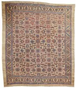 “Antique Bakhshaysh carpet with rare ground colour and floral design” “Vintage Persian rug from Bakhshaysh with yellow and blue borders” “All-over floral lozenge pattern antique carpet” “Decorative Heriz region rug with soft natural colours”