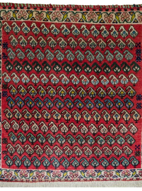 alt="Vintage Qashqai bag face with boteh motifs on red background" alt="Tribal Persian textile with cream floral border and paisley design" alt="Handwoven Qashqai bag face from South Iran" alt="Decorative vintage tribal bag face with boteh motifs"
