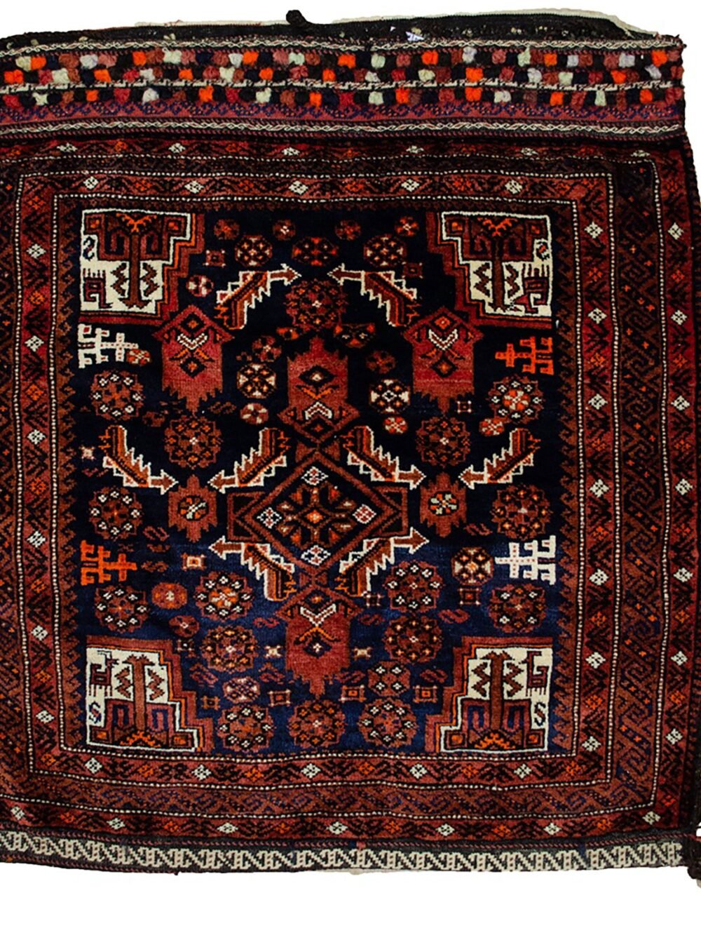 alt="Vintage Baluch tribal bag with dowry tufts and goat motifs" alt="Handwoven Baluch bag with red kilim S-design and flowerheads" alt="Antique Baluch wool bag with tribal symbolism from Northeast Iran" alt="Collectible Persian tribal bag with rich colours and unique details"
