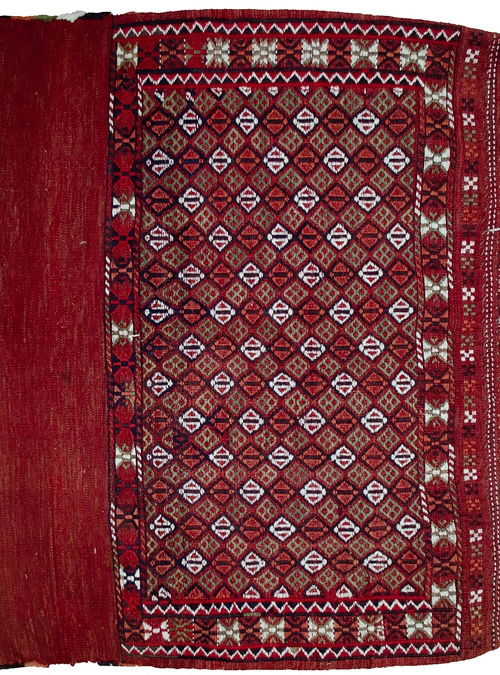 alt="Vintage Turkman Tobreh bag with snowflake and butterfly motifs" alt="Handwoven tribal bag from Northeast Iran with lozenge design" alt="Decorative vintage Turkman textile with traditional tribal symbols" alt="Turkman Tobreh bag featuring snowflake and butterfly patterns"