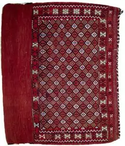 alt="Vintage Turkman Tobreh bag with snowflake and butterfly motifs" alt="Handwoven tribal bag from Northeast Iran with lozenge design" alt="Decorative vintage Turkman textile with traditional tribal symbols" alt="Turkman Tobreh bag featuring snowflake and butterfly patterns"