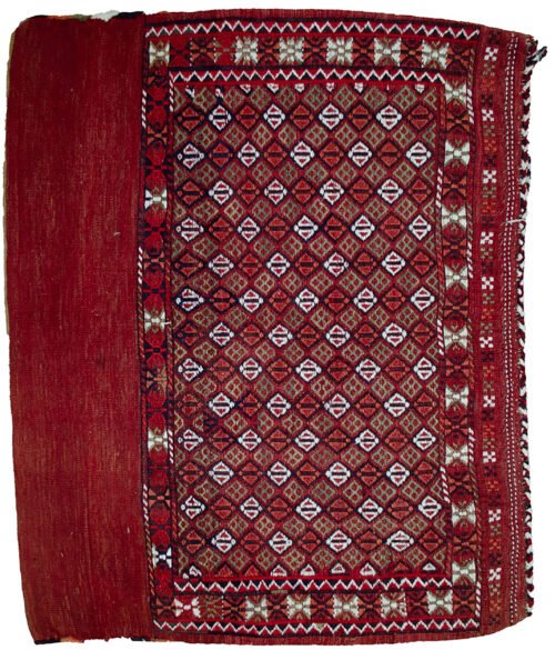 alt="Vintage Turkman Tobreh bag with snowflake and butterfly motifs" alt="Handwoven tribal bag from Northeast Iran with lozenge design" alt="Decorative vintage Turkman textile with traditional tribal symbols" alt="Turkman Tobreh bag featuring snowflake and butterfly patterns"