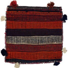 alt="Vintage Kurdish bag face with raindrop and flower head motifs" alt="Handwoven Somak and flatweave textile from Ghoochan, Iran" alt="Kurdish tribal bag fragment with coloured bands and traditional symbols" alt="Decorative vintage bag face with dual flatweave techniques"