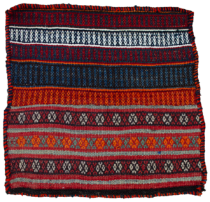 alt="Vintage Kurdish bag face with raindrop and flower head motifs" alt="Handwoven Somak and flatweave Kurdish textile from Northeast Iran" alt="Kurdish tribal bag fragment with colourful bands and symbolic motifs" alt="Decorative vintage Ghoochan Kurdish bag face with flatweave detailing"