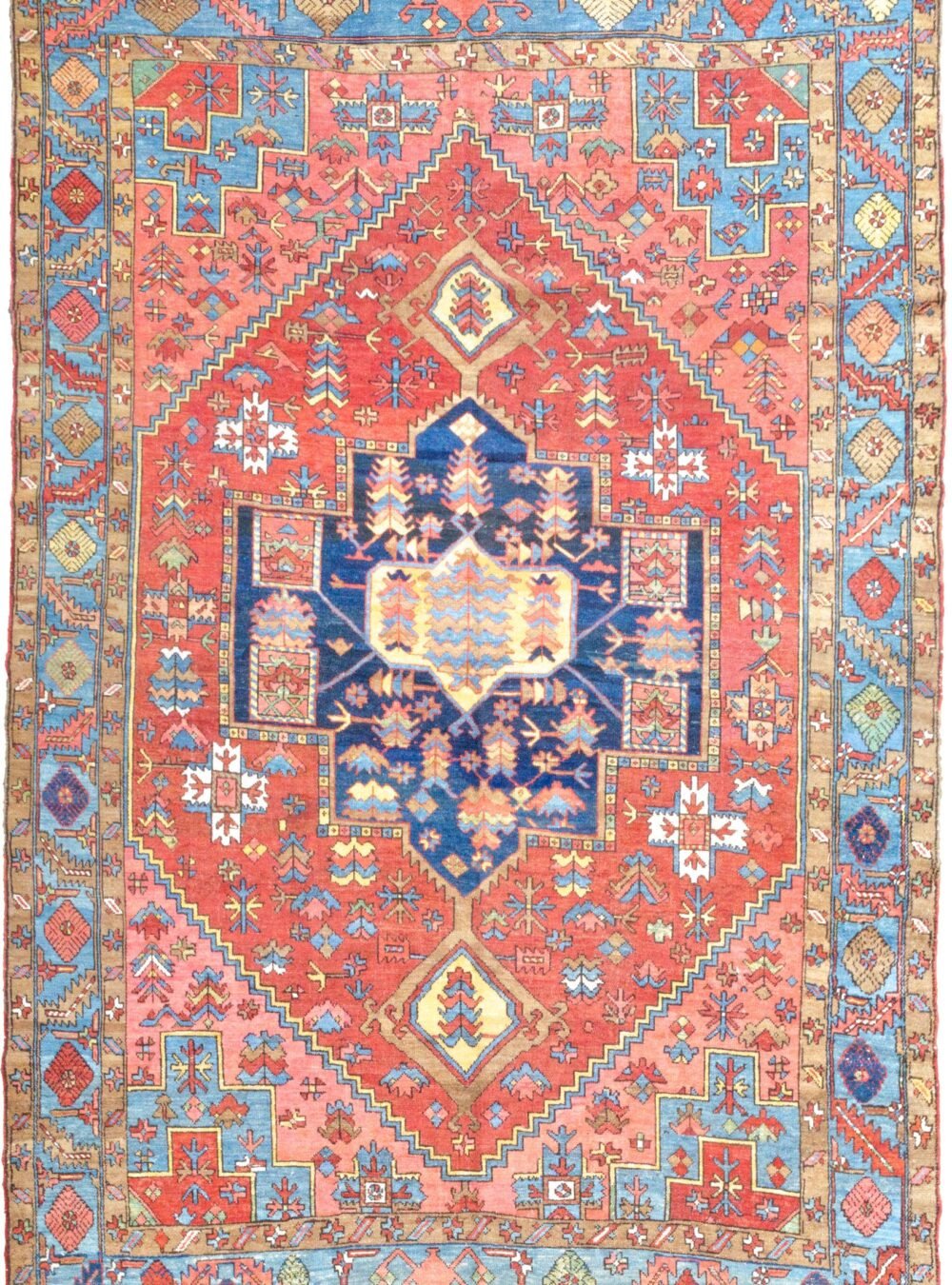 alt="Unusual Heriz or Karaja carpet with terracotta ground and blue, peach, yellow accents" alt="Characterful Persian rug with unique medallion and harmonious colour palette" alt="Restored antique Heriz Karaja rug with geometric motifs and warm tones" alt="Decorative Heriz rug with rare spandrel design and terracotta base"