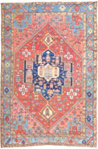 alt="Unusual Heriz or Karaja carpet with terracotta ground and blue, peach, yellow accents" alt="Characterful Persian rug with unique medallion and harmonious colour palette" alt="Restored antique Heriz Karaja rug with geometric motifs and warm tones" alt="Decorative Heriz rug with rare spandrel design and terracotta base"