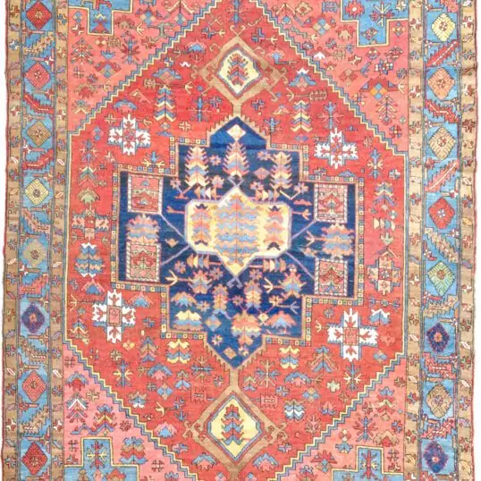 alt="Unusual Heriz or Karaja carpet with terracotta ground and blue, peach, yellow accents" alt="Characterful Persian rug with unique medallion and harmonious colour palette" alt="Restored antique Heriz Karaja rug with geometric motifs and warm tones" alt="Decorative Heriz rug with rare spandrel design and terracotta base"