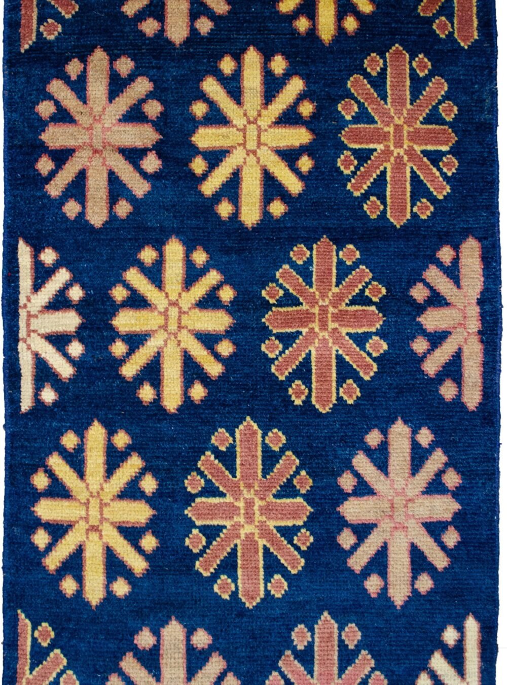 alt="Customisable modern-style Ushak mat with antique finish" alt="Indigo Ushak mat made with handspun wool and natural dyes" alt="Small antique-look rug in modern design, available to order" alt="Handmade Ushak accent mat with soft aged finish"