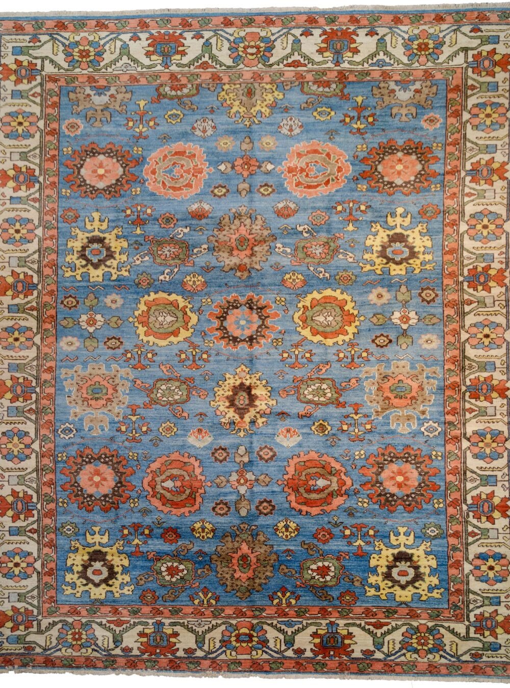 alt="Serapi Heriz rug with harchang design on light blue field" alt="Hand-knotted Persian rug with cream floral border and antique finish" alt="New Serapi Heriz production using handspun wool and natural dyes" alt="Traditional Persian rug with crab motif and antique look"