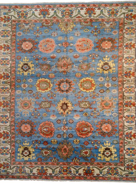 alt="Serapi Heriz rug with harchang design on light blue field" alt="Hand-knotted Persian rug with cream floral border and antique finish" alt="New Serapi Heriz production using handspun wool and natural dyes" alt="Traditional Persian rug with crab motif and antique look"