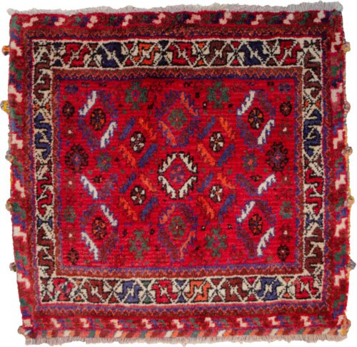 alt="Nomadic bag with deep red field and fish motifs in lozenge pattern" alt="Tribal Persian bag with cream border and shiny wool" alt="Handwoven wool nomadic textile with geometric fish design" alt="Vintage tribal bag from Iran with red and cream colour scheme"