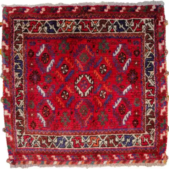 alt="Nomadic bag with deep red field and fish motifs in lozenge pattern" alt="Tribal Persian bag with cream border and shiny wool" alt="Handwoven wool nomadic textile with geometric fish design" alt="Vintage tribal bag from Iran with red and cream colour scheme"