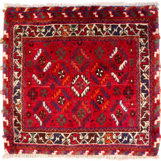 alt="Nomadic bag with deep red field and fish motifs in lozenge pattern" alt="Tribal Persian bag with cream border and shiny wool" alt="Handwoven wool nomadic textile with geometric fish design" alt="Vintage tribal bag from Iran with red and cream colour scheme"