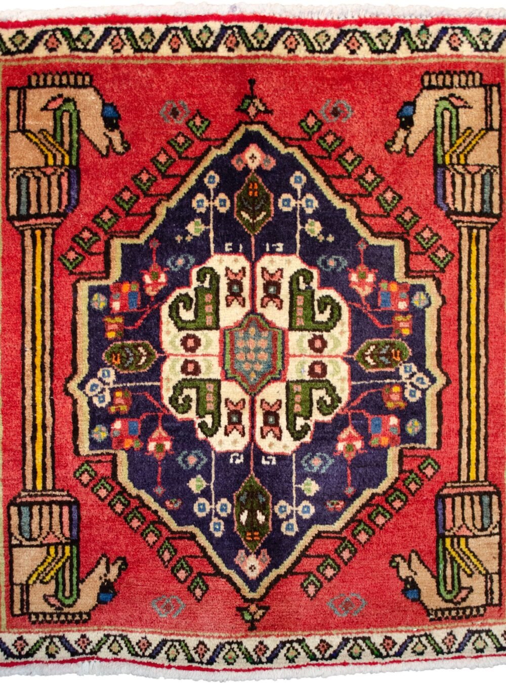 alt="Qashqai rug with Persepolis pillar and Hashtgol medallion" alt="Tribal Persian rug with horse head pillar design and paisley motif" alt="Handwoven Qashqai rug with eight-flower Hashtgol medallion" alt="Torki weave Persian rug with traditional tribal design"