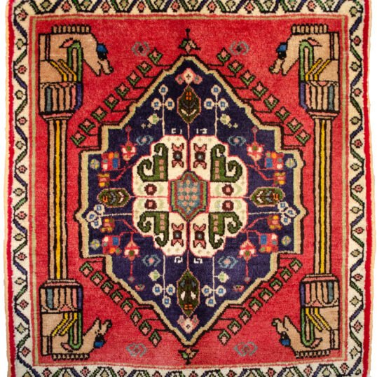 alt="Qashqai rug with Persepolis pillar and Hashtgol medallion" alt="Tribal Persian rug with horse head pillar design and paisley motif" alt="Handwoven Qashqai rug with eight-flower Hashtgol medallion" alt="Torki weave Persian rug with traditional tribal design"