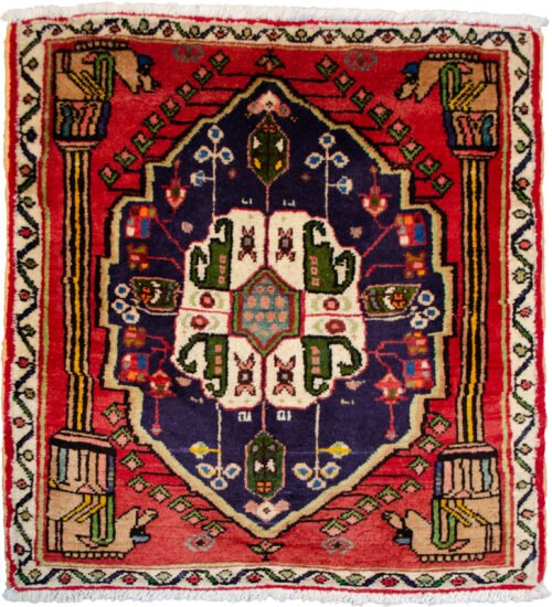 alt="Qashqai rug with Hashtgol medallion and Persepolis pillar design" alt="Persian tribal rug with horse-head pillar motif and paisley medallion" alt="Torki weave Qashqai rug with eight-paisley Hashtgol centre" alt="Hand-knotted Persian rug with classical and tribal motifs"