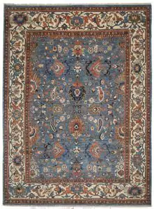 alt="Sultanabad-style rug with light blue field and cream border" alt="Persian production carpet with boteh and samovar motifs" alt="Antique-finish rug inspired by a Christie’s-sold original" alt="Decorative Persian rug with islimi and floral elements"