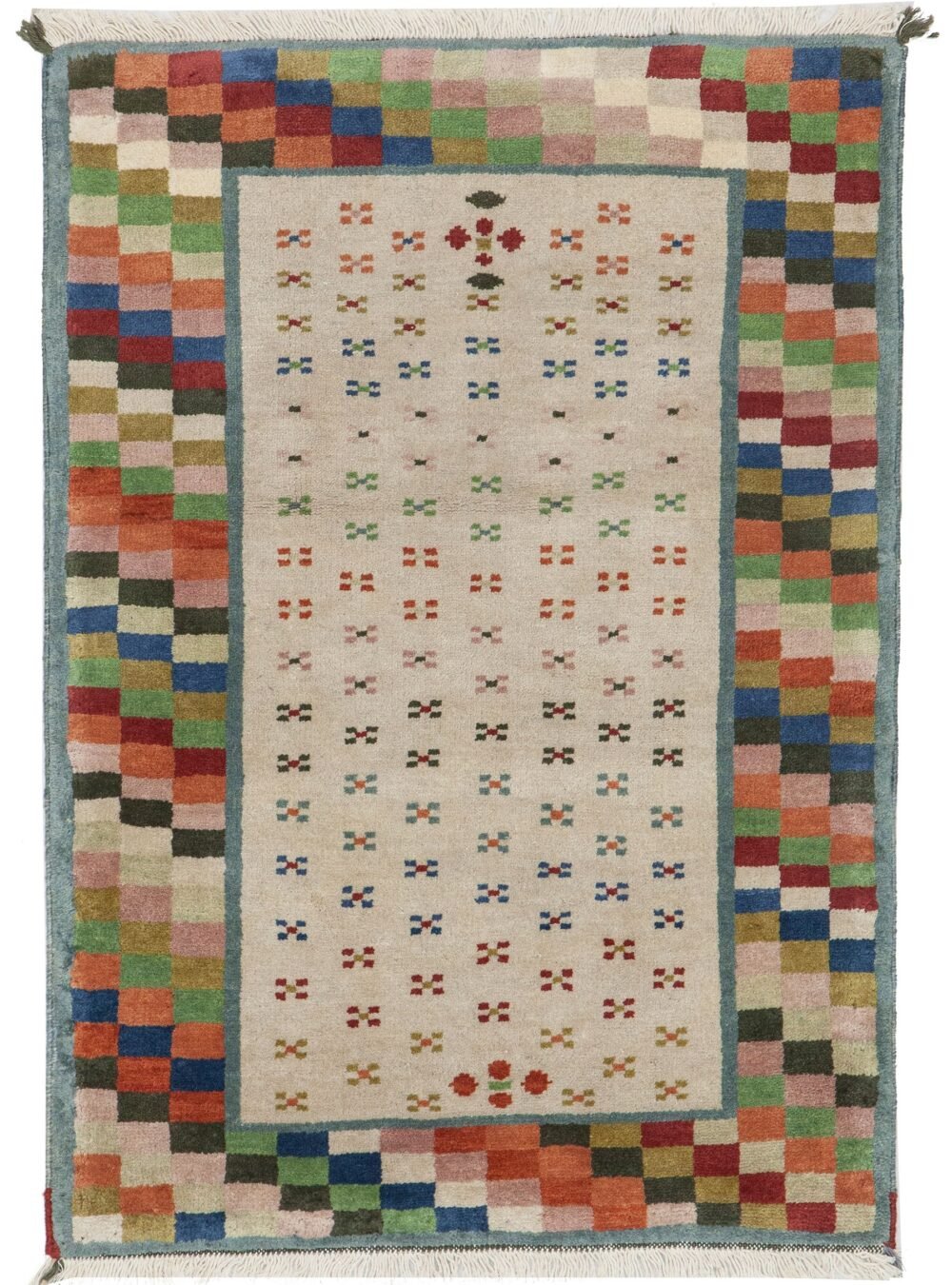 alt="Modern Savonnerie-style rug with multicoloured checked border" alt="Contemporary interpretation of Savonnerie weaving with simple field" alt="Sample Savonnerie rug with bold border and plain interior" alt="Savonnerie weave rug with modern pattern and vibrant edge"