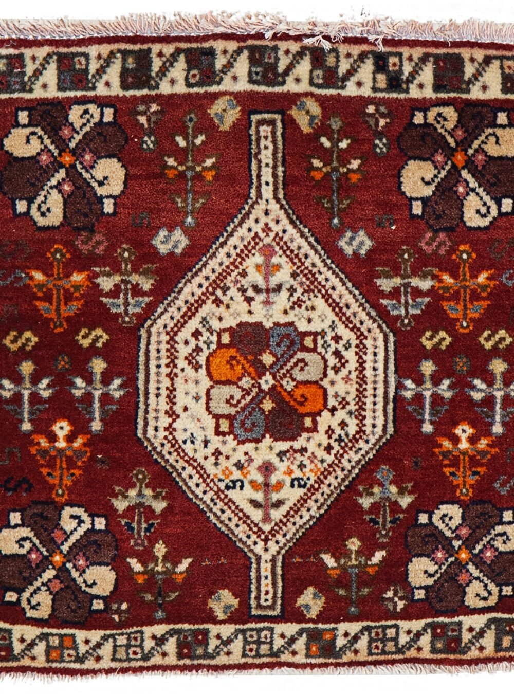 alt="Small Shiraz mat with eight-paisley flower medallion" alt="Tribal Persian wool mat with central boteh motif flower" alt="Shiraz mat with shiny wool and rich colours" alt="Mini Persian rug with symbolic floral medallion"