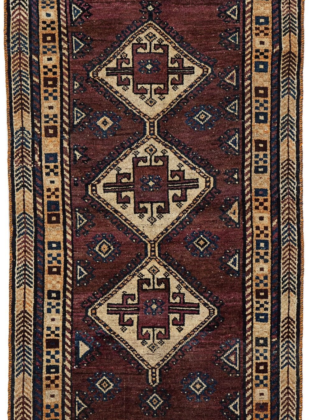 alt="Vintage Lori Behbahan rug with aubergine ground and triple medallion" alt="South Iranian tribal rug with plain field and characterful wear" alt="Decorative Persian rug in rare purple tones and simple layout" alt="Worn but elegant Lori Behbahan carpet with rich colour palette"