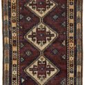 alt="Vintage Lori Behbahan rug with aubergine ground and triple medallion" alt="South Iranian tribal rug with plain field and characterful wear" alt="Decorative Persian rug in rare purple tones and simple layout" alt="Worn but elegant Lori Behbahan carpet with rich colour palette"