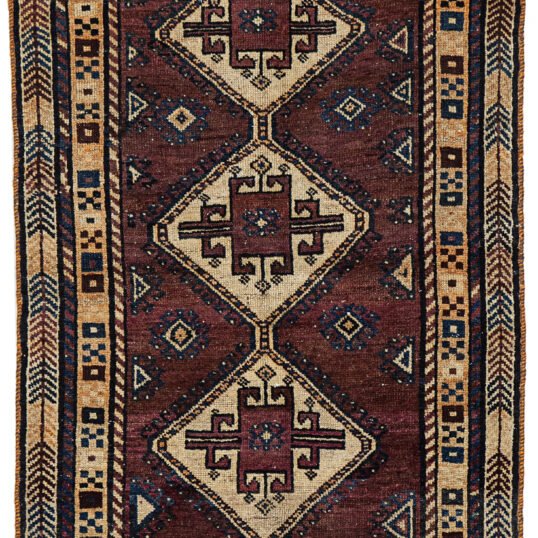 alt="Vintage Lori Behbahan rug with aubergine ground and triple medallion" alt="South Iranian tribal rug with plain field and characterful wear" alt="Decorative Persian rug in rare purple tones and simple layout" alt="Worn but elegant Lori Behbahan carpet with rich colour palette"