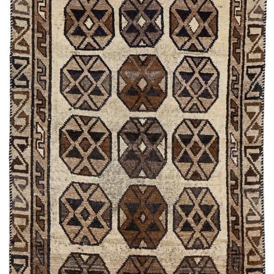 alt="Vintage Gabbeh rug with three octagons on aged cream background" alt="Worn tribal Persian rug with simple geometric motifs" alt="Gabbeh rug from South Iran with faded cream field and rustic charm" alt="Low pile antique Gabbeh with mellowed colours and octagon design"