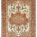alt="Serapi Heriz rug with cream field and red medallion" alt="Handwoven Heriz carpet with peach spandrels and geometric border" alt="Traditional Persian-style rug with antique finish and natural dyes" alt="Serapi rug with handspun wool and soft red medallion"
