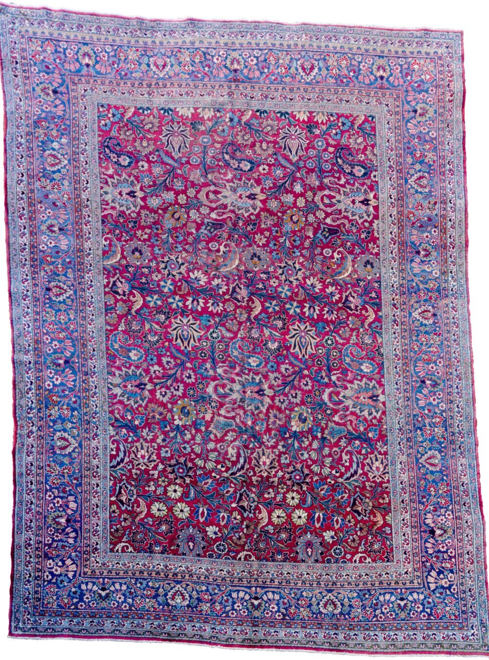 alt="Mashad carpet with maroon red field and floral palmette design" alt="Persian rug from Mashad with blue floral borders and vines" alt="High-quality wool Mashad rug with palmettes and natural dyes" alt="Traditional Persian carpet with red ground and elegant floral detailing"