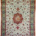 alt="Tabriz carpet with pistachio green field and central medallion" alt="Fine 60 raj Persian rug with floral design and scrolling green border" alt="Vintage Tabriz carpet with soft wool and old repairs" alt="Northwest Iran Tabriz rug in green tones with elegant floral pattern"