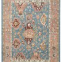 alt="Light blue Ushak carpet with random stylised floral motifs" alt="Decorative Turkish rug with peach border and cream guard accents" alt="Ushak carpet with geometric floral design and natural dye wool" alt="Modern Ushak rug with antique aesthetic and soft blue ground"