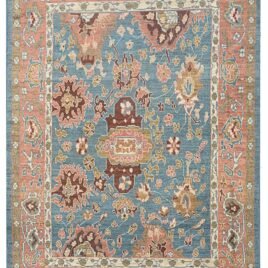 alt="Light blue Ushak carpet with random stylised floral motifs" alt="Decorative Turkish rug with peach border and cream guard accents" alt="Ushak carpet with geometric floral design and natural dye wool" alt="Modern Ushak rug with antique aesthetic and soft blue ground"