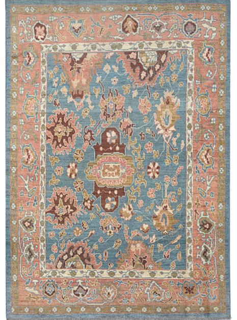 alt="Light blue Ushak carpet with random stylised floral motifs" alt="Decorative Turkish rug with peach border and cream guard accents" alt="Ushak carpet with geometric floral design and natural dye wool" alt="Modern Ushak rug with antique aesthetic and soft blue ground"