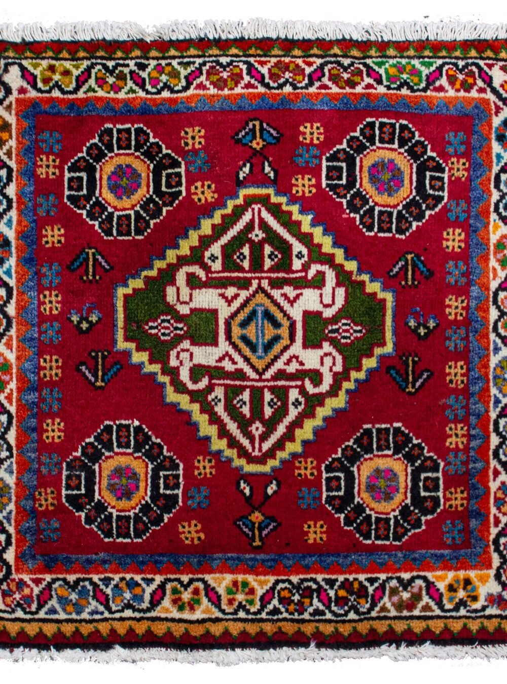 alt="Qashqai mat with scarab beetle medallion and corner flower motifs" alt="Tribal Persian rug from South Iran with vibrant colours and symbolic design" alt="Handwoven Qashqai wool mat with central medallion and floral corners" alt="Vivid Qashqai mat featuring scarab beetle motif and fine tribal weave"