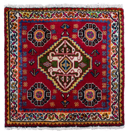 alt="Qashqai mat with scarab beetle medallion and corner flower motifs" alt="Tribal Persian rug from South Iran with vibrant colours and symbolic design" alt="Handwoven Qashqai wool mat with central medallion and floral corners" alt="Vivid Qashqai mat featuring scarab beetle motif and fine tribal weave"