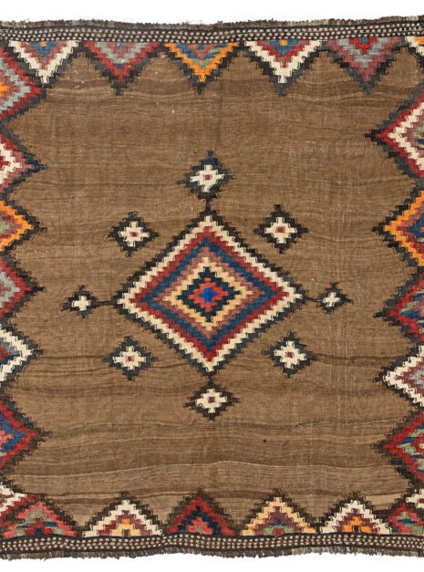 alt="Antique Varamin kilim with camel ground and multicoloured medallion" alt="Persian tribal kilim with handspun wool and natural dyes" alt="Varamin kilim featuring wave-like abrushes and floral end designs" alt="Collector-quality Varamin kilim with geometric medallion and camel field"