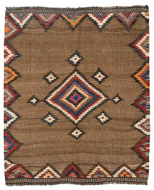 alt="Antique Varamin kilim with camel ground and multicoloured medallion" alt="Persian tribal kilim with handspun wool and natural dyes" alt="Varamin kilim featuring wave-like abrushes and floral end designs" alt="Collector-quality Varamin kilim with geometric medallion and camel field"
