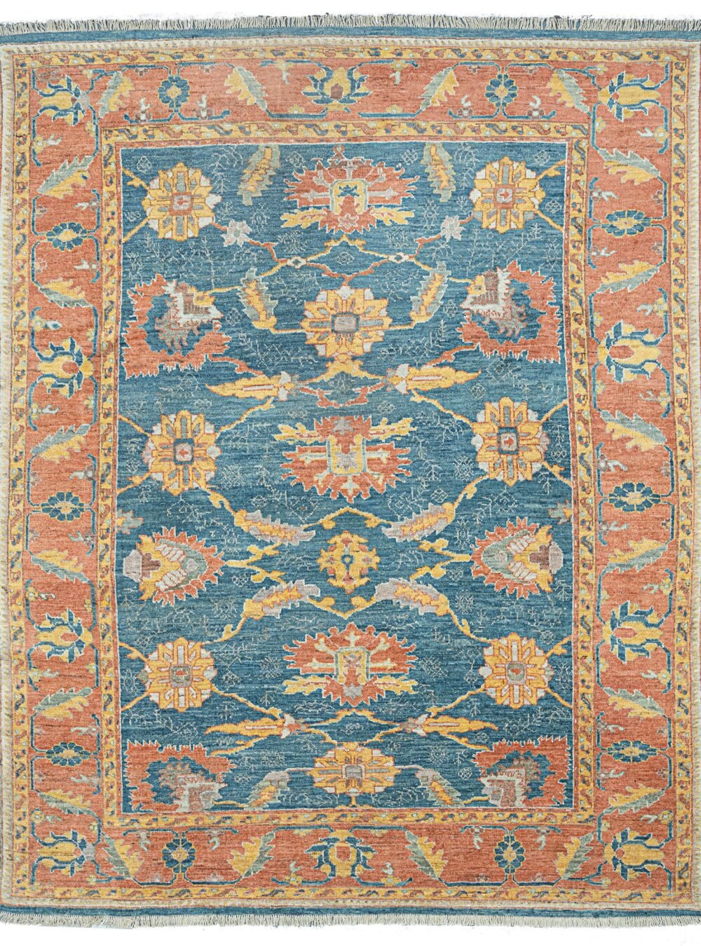 alt="Ushak carpet with blue background and large floral vine design" alt="New antique-look Turkish rug with terracotta floral border" alt="Handspun wool Ushak rug with authentic weave and natural dyes" alt="Decorative blue and terracotta Ushak carpet with aged finish