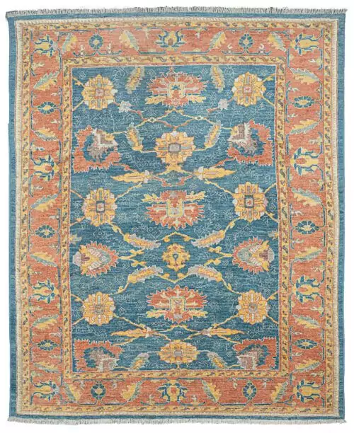 alt="Ushak carpet with blue background and large floral vine design" alt="New antique-look Turkish rug with terracotta floral border" alt="Handspun wool Ushak rug with authentic weave and natural dyes" alt="Decorative blue and terracotta Ushak carpet with aged finish