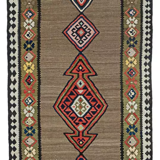 alt="Antique Shahsavan kilim runner with medallions and olive floral border" alt="Grey-brown Persian kilim with abrushes and geometric lozenges" alt="Finely woven Shahsavan runner with tribal motifs and cream border" alt="Decorative collector’s kilim with stylised floral heads and medallion design"