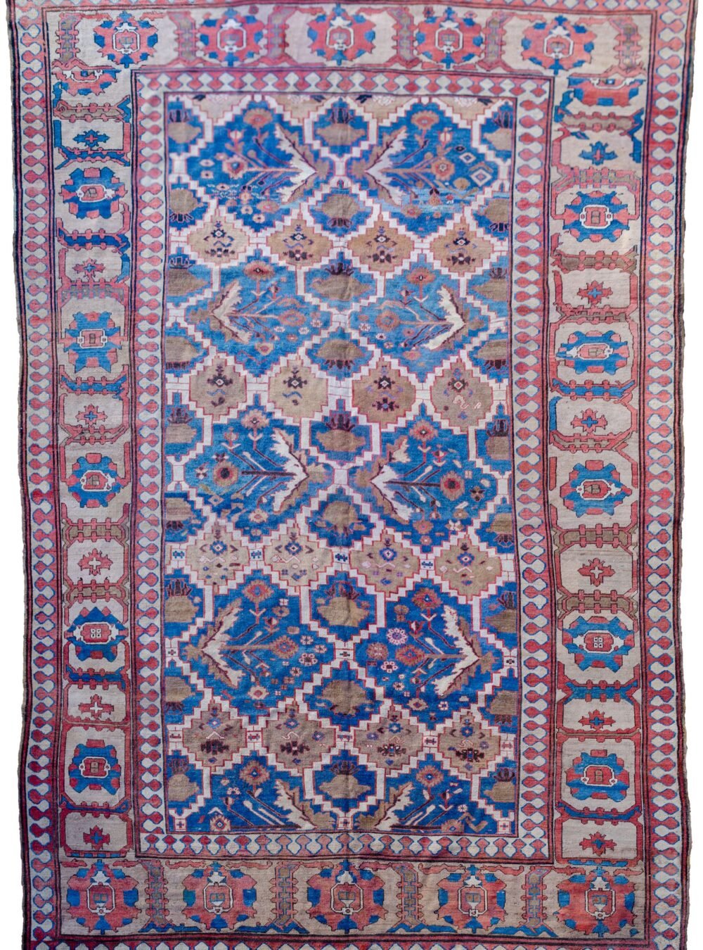 alt="Bakhshayesh carpet with blue field and all-over bush design" alt="Persian rug with lozenge bands and geometric light brown border" alt="Rare Bakhshayesh carpet with tribal bush motifs and decorative colors" alt="Traditional Persian rug from Northwest Iran with unique all-over pattern"