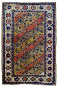 alt="Vintage Turkish rug with multicoloured diagonal floral design" alt="Turkish wool rug with cream border and stylised flowerheads" alt="Handwoven Turkish rug with diagonal stripe floral pattern" alt="Decorative Turkish carpet with high-quality wool and dyes"