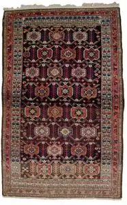 alt="Antique Shahsavan rug with cartouche and tulip border design" alt="Tribal Persian rug from Saveh with cypress and flower head motifs" alt="Navy-grey field Shahsavan rug with cream tulip border" alt="Abrash detail in antique Shahsavan carpet"