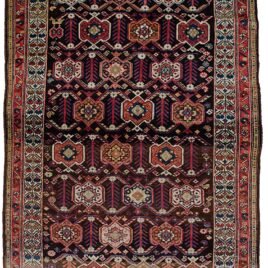 alt="Antique Shahsavan rug with cartouche and tulip border design" alt="Tribal Persian rug from Saveh with cypress and flower head motifs" alt="Navy-grey field Shahsavan rug with cream tulip border" alt="Abrash detail in antique Shahsavan carpet"