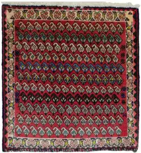alt="Vintage Qashqai bag face with boteh motifs on red background" alt="Tribal Persian textile with cream floral border and paisley design" alt="Handwoven Qashqai bag face from South Iran" alt="Decorative vintage tribal bag face with boteh motifs"
